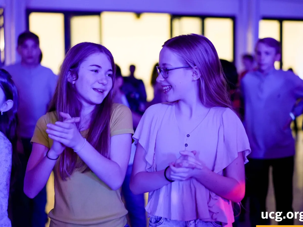 two girls clapping their hands