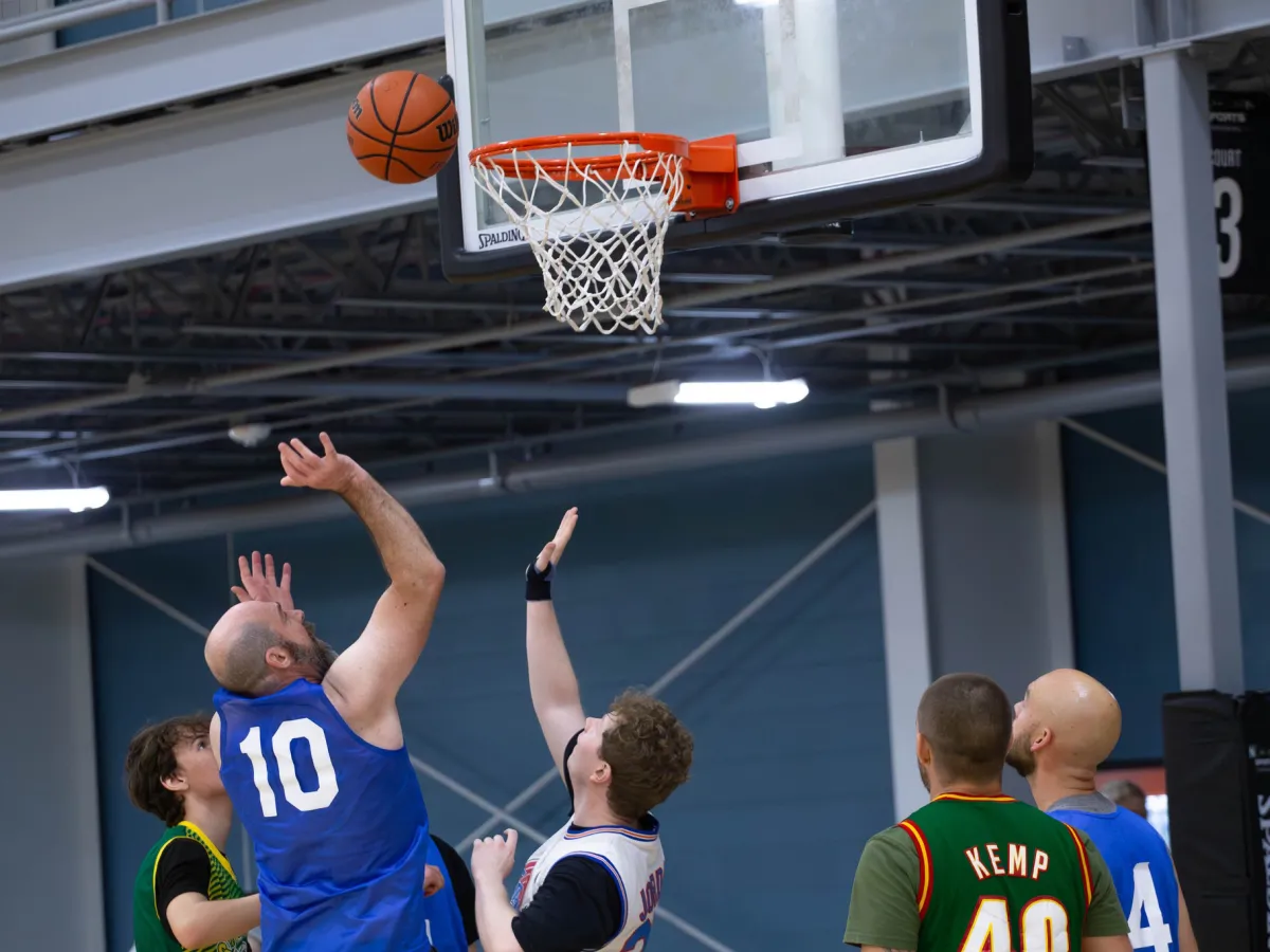 men playing basketball