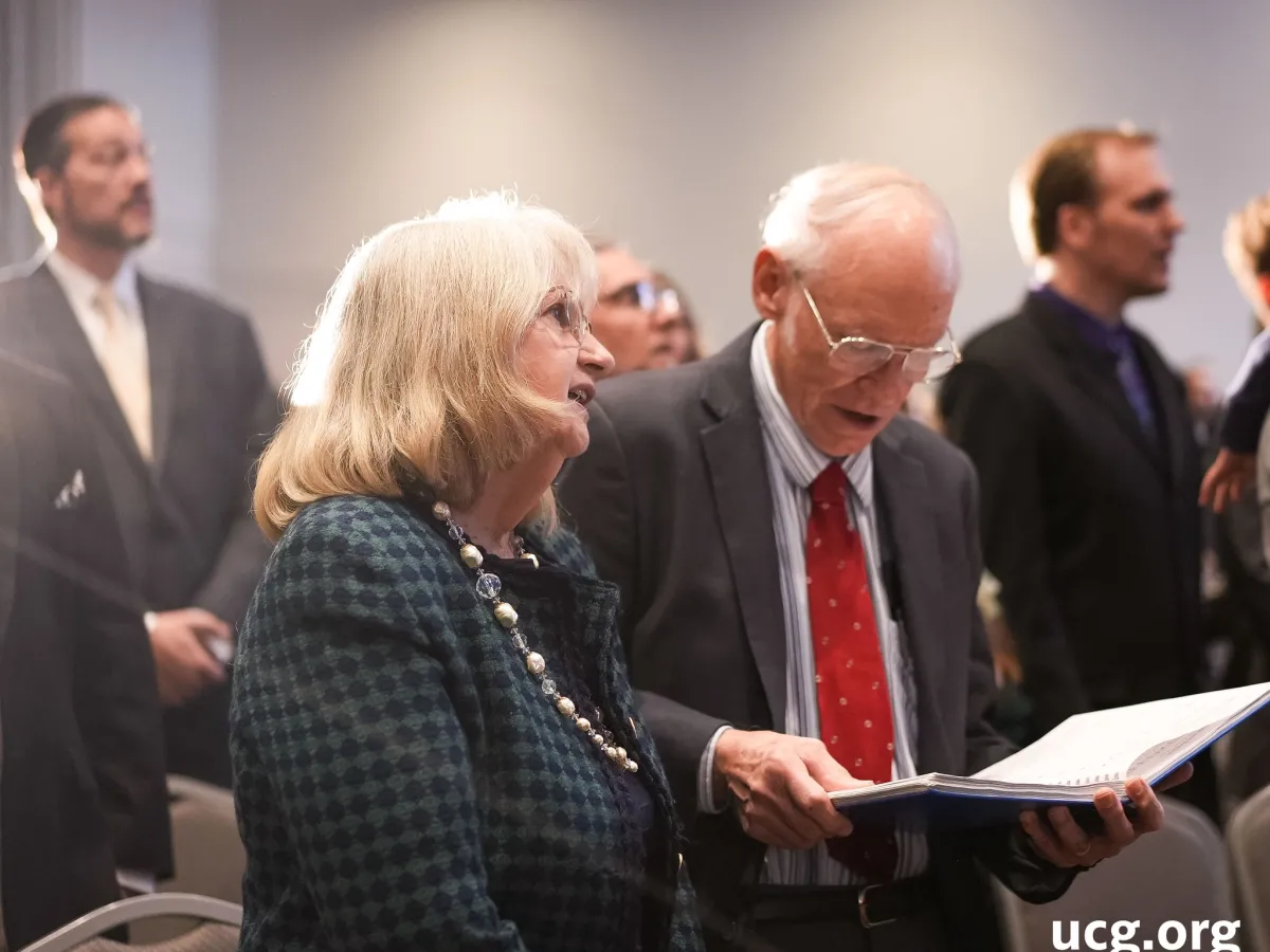 people singing hymns in church