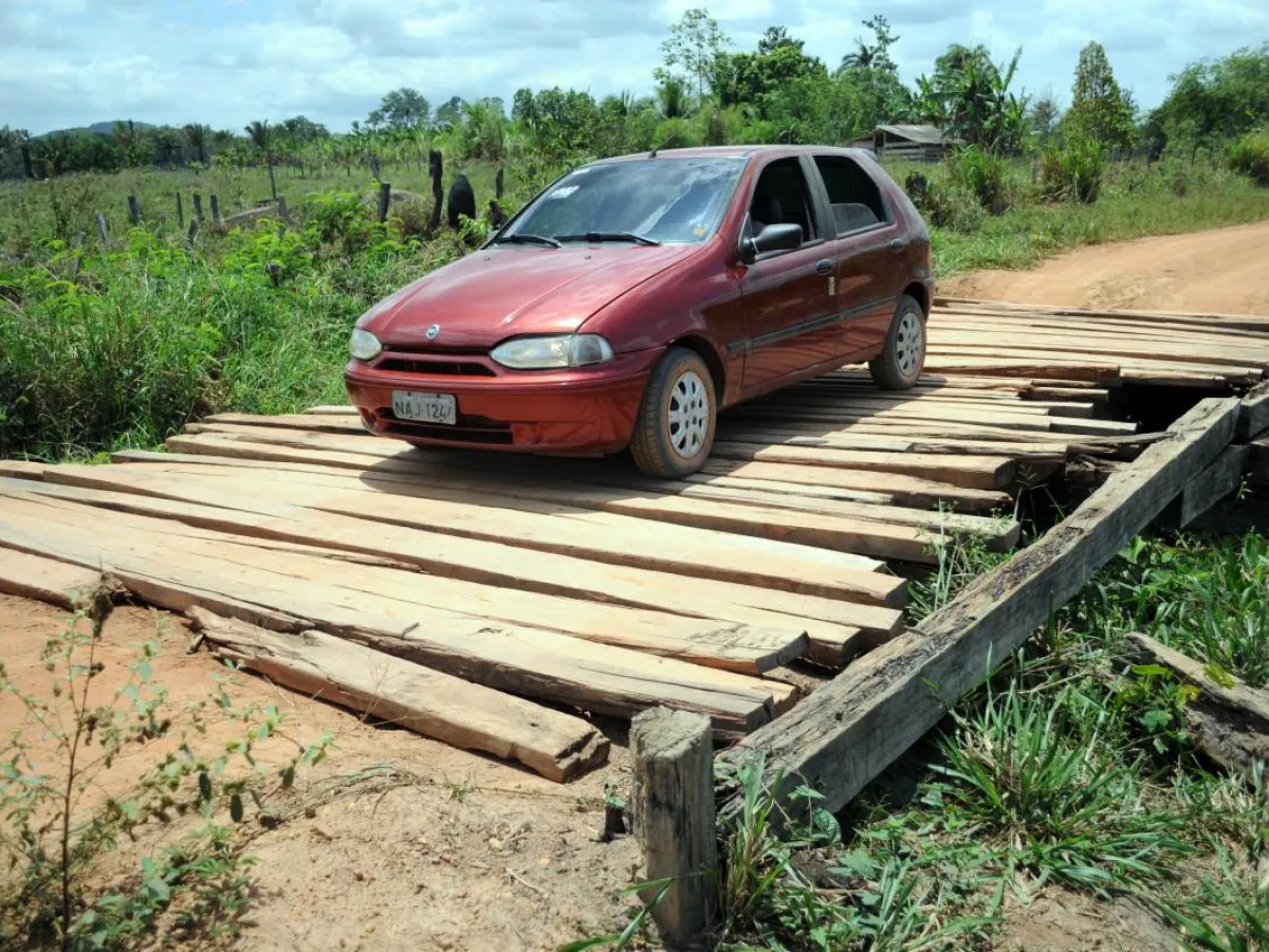 Rickety bridge that barely supports a car
